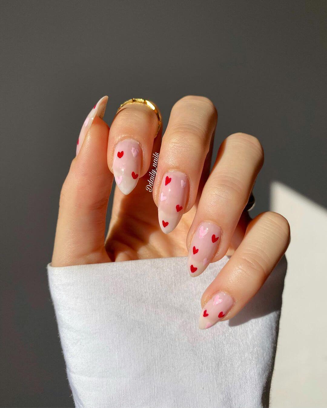 Floating Mini Hearts Over Pink Nails