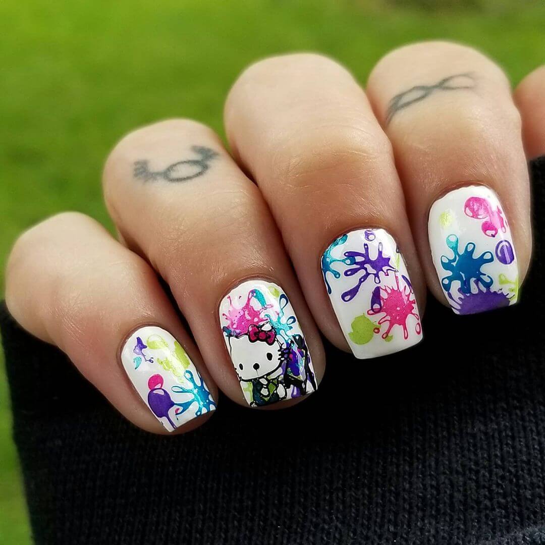 Hello Kitty with colour splashes nail art design