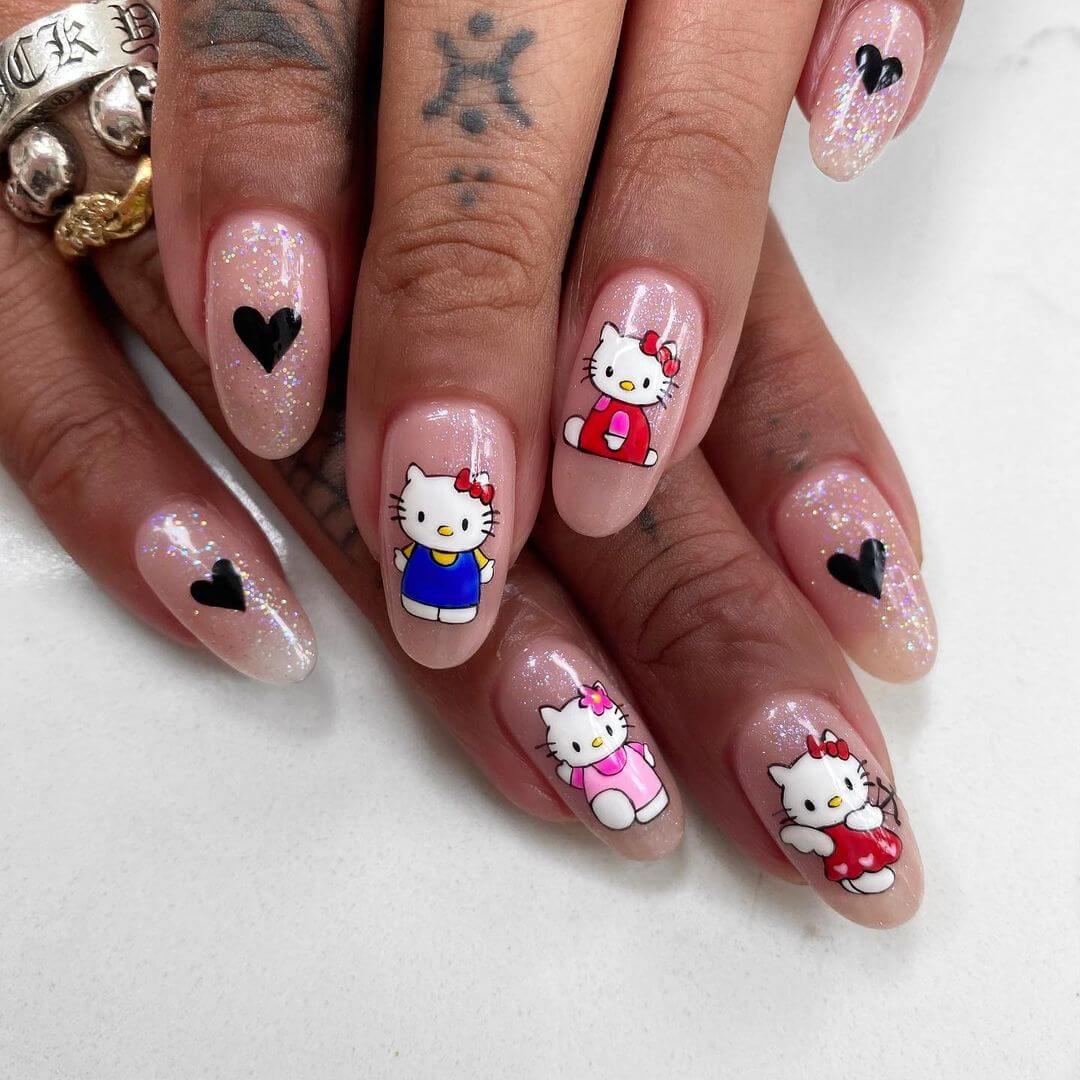 Hello Kitty Nail Art Designs Hello Kitty in different costumes nail art design