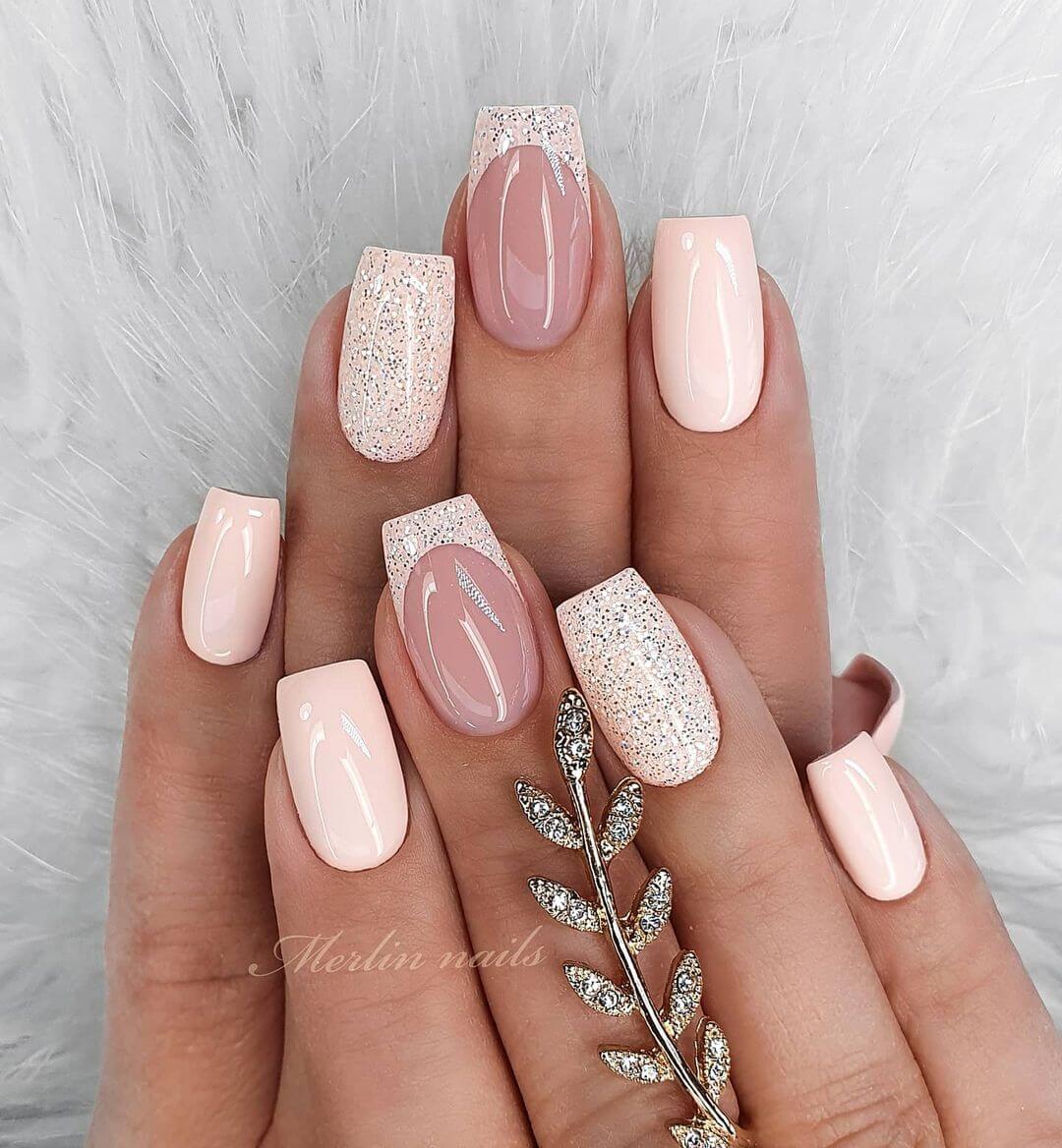 Pastel colours with glittery nail art