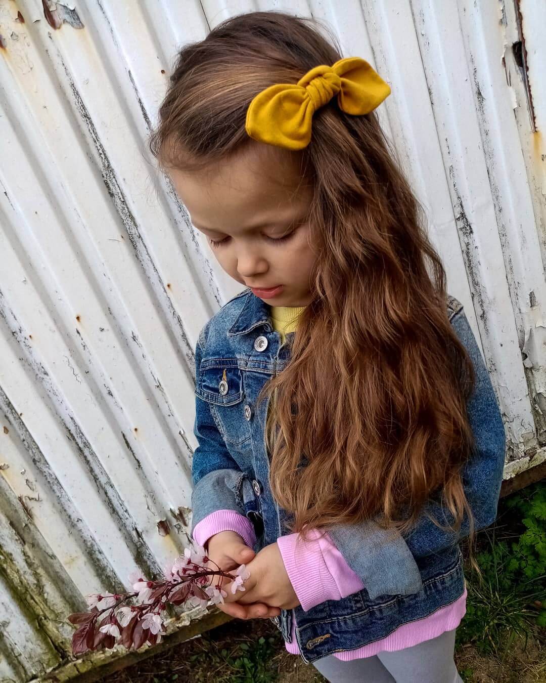 The Side Bow hairstyles for Kids With Long hair