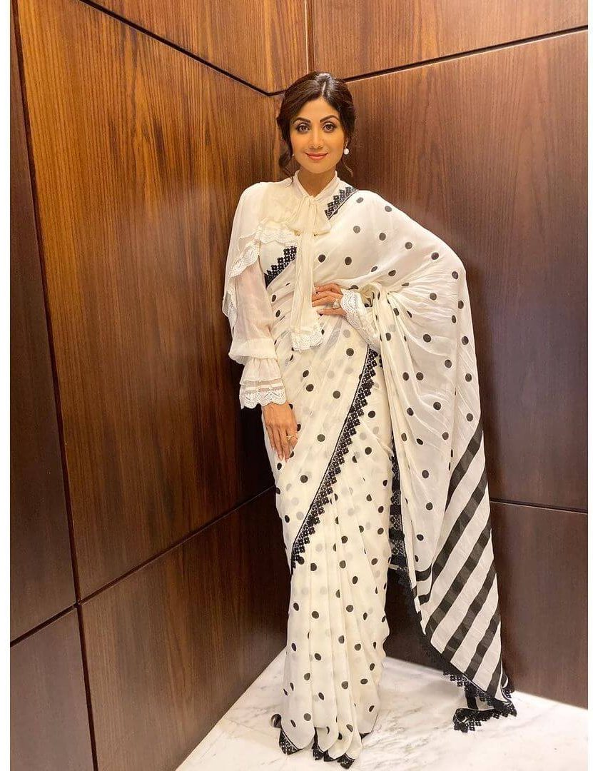 White And Black Polka Dots Saree With A Knotted Neck Blouse
