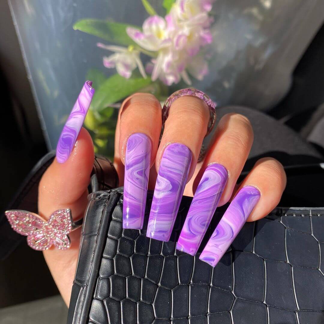 Artistic purple nail art design