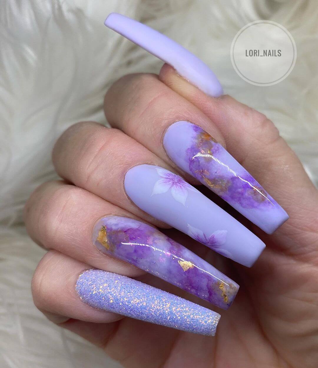 Floral purple nail art design