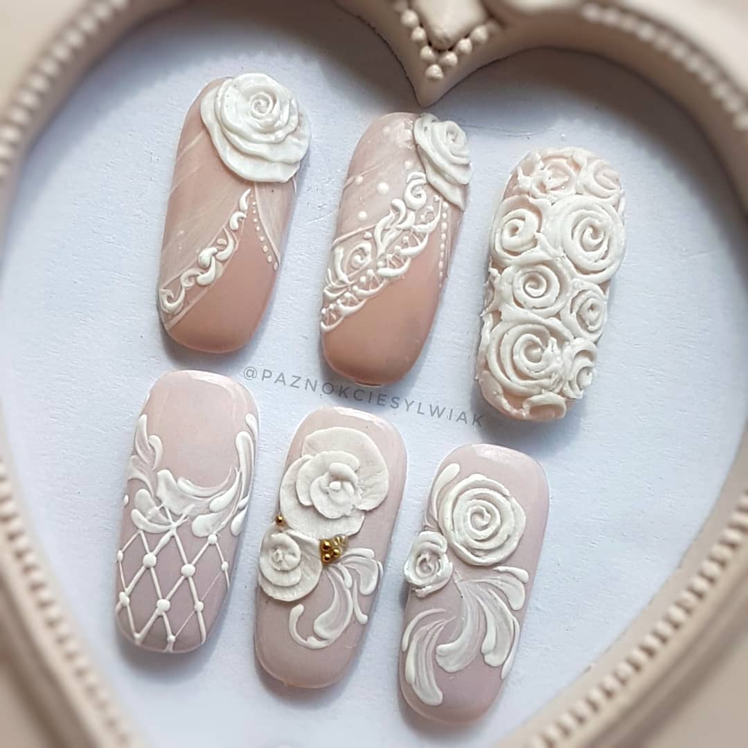 Rose in white and skin nail art design