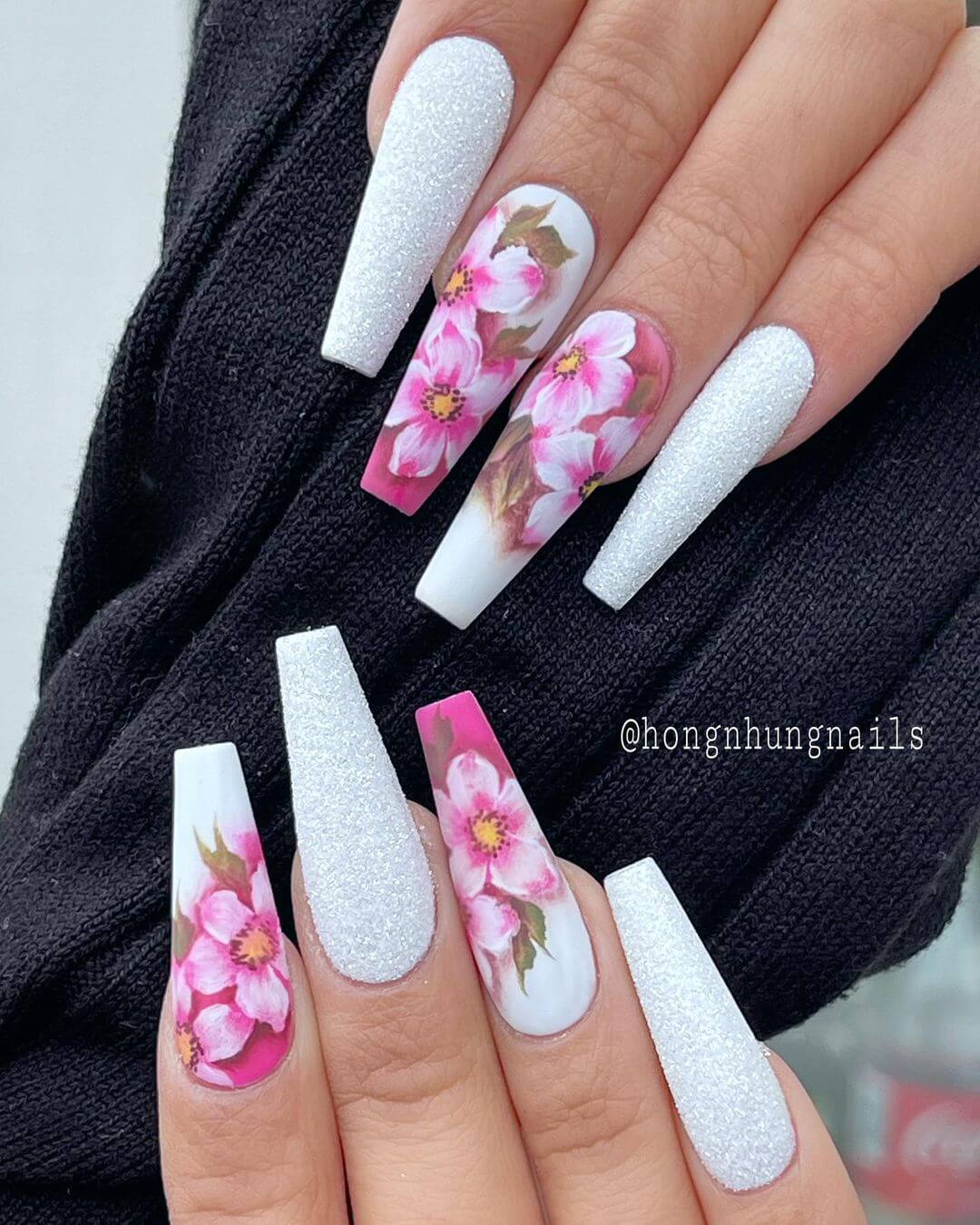 Roses in pink and silver nail art design