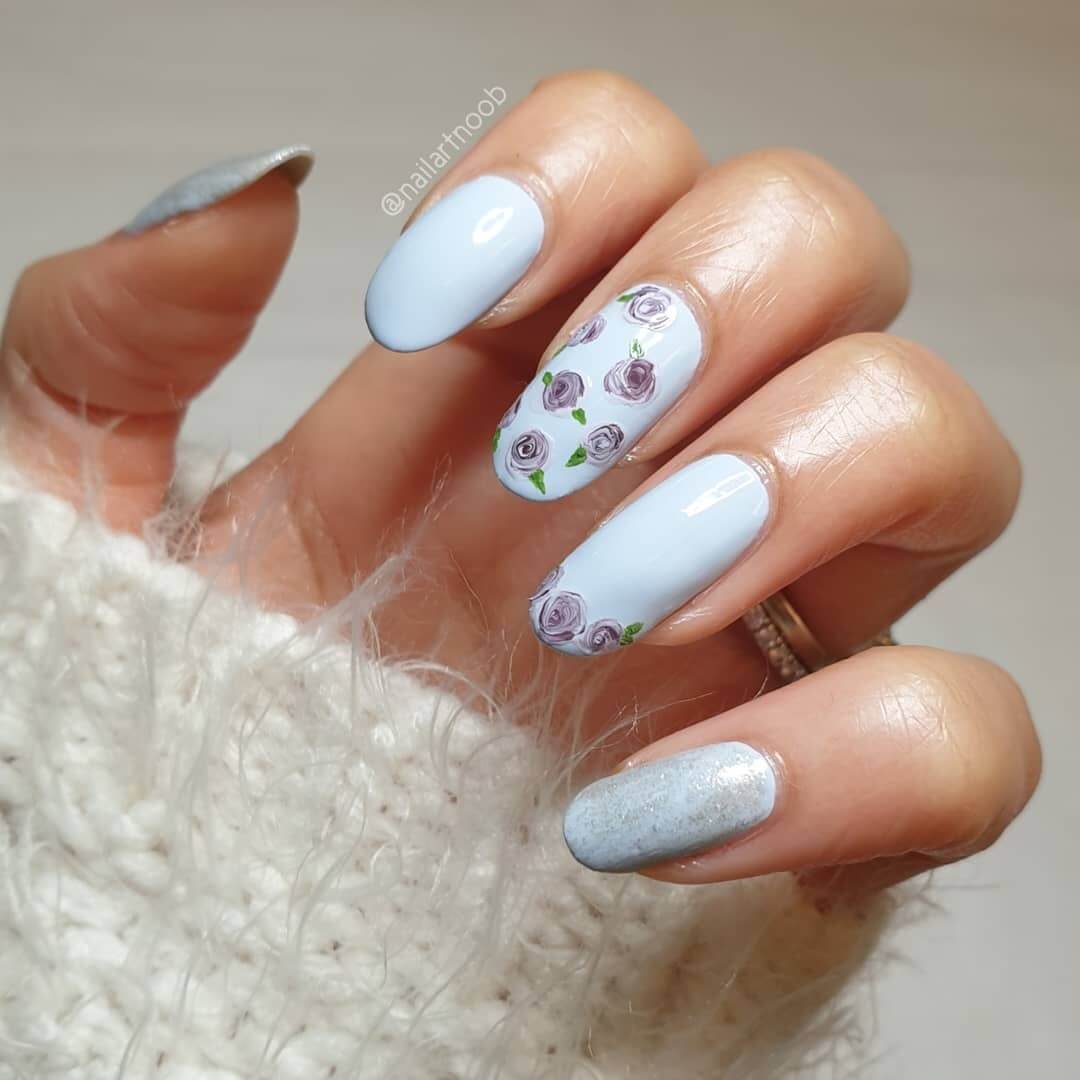 Roses in blue shades nail art design