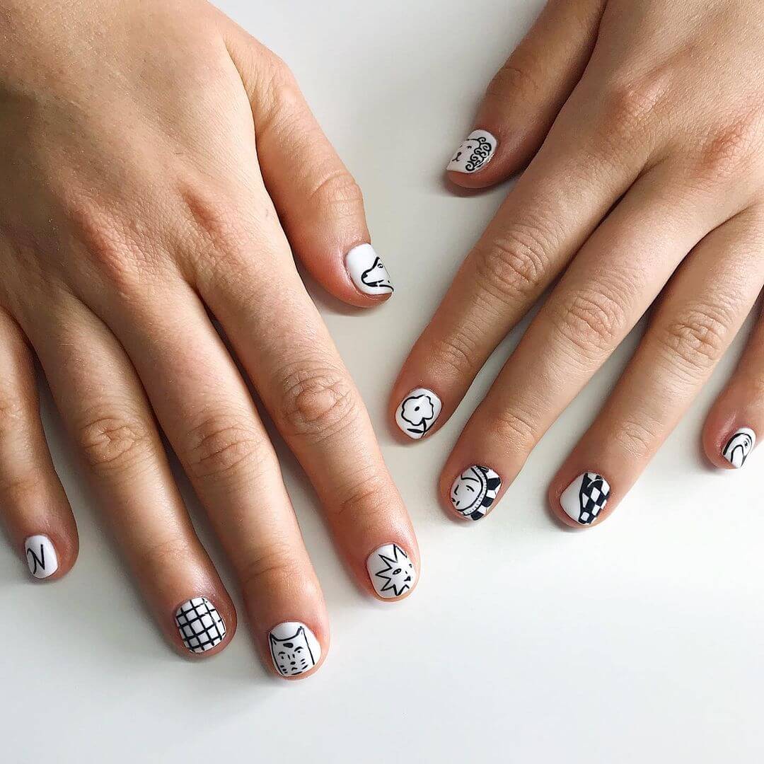 Checkered and other patterns tattoo nail art design