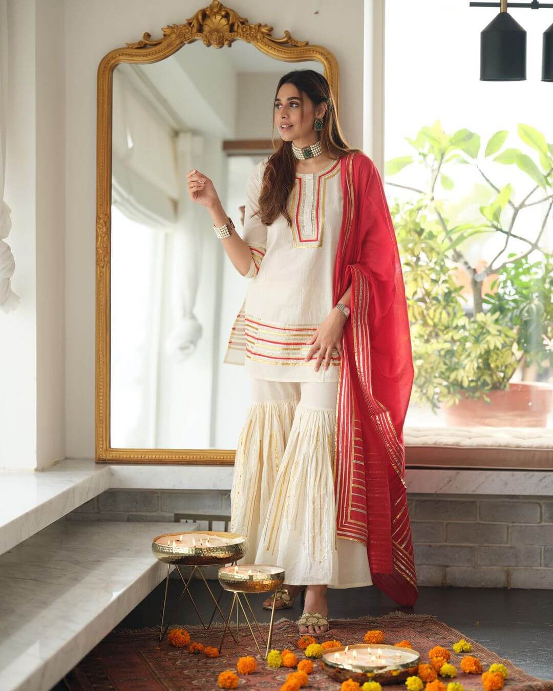 20+ Trending Diwali Outfit Ideas for you to choose from White Kurti with Red Dupatta for an Effortlessly elegant look