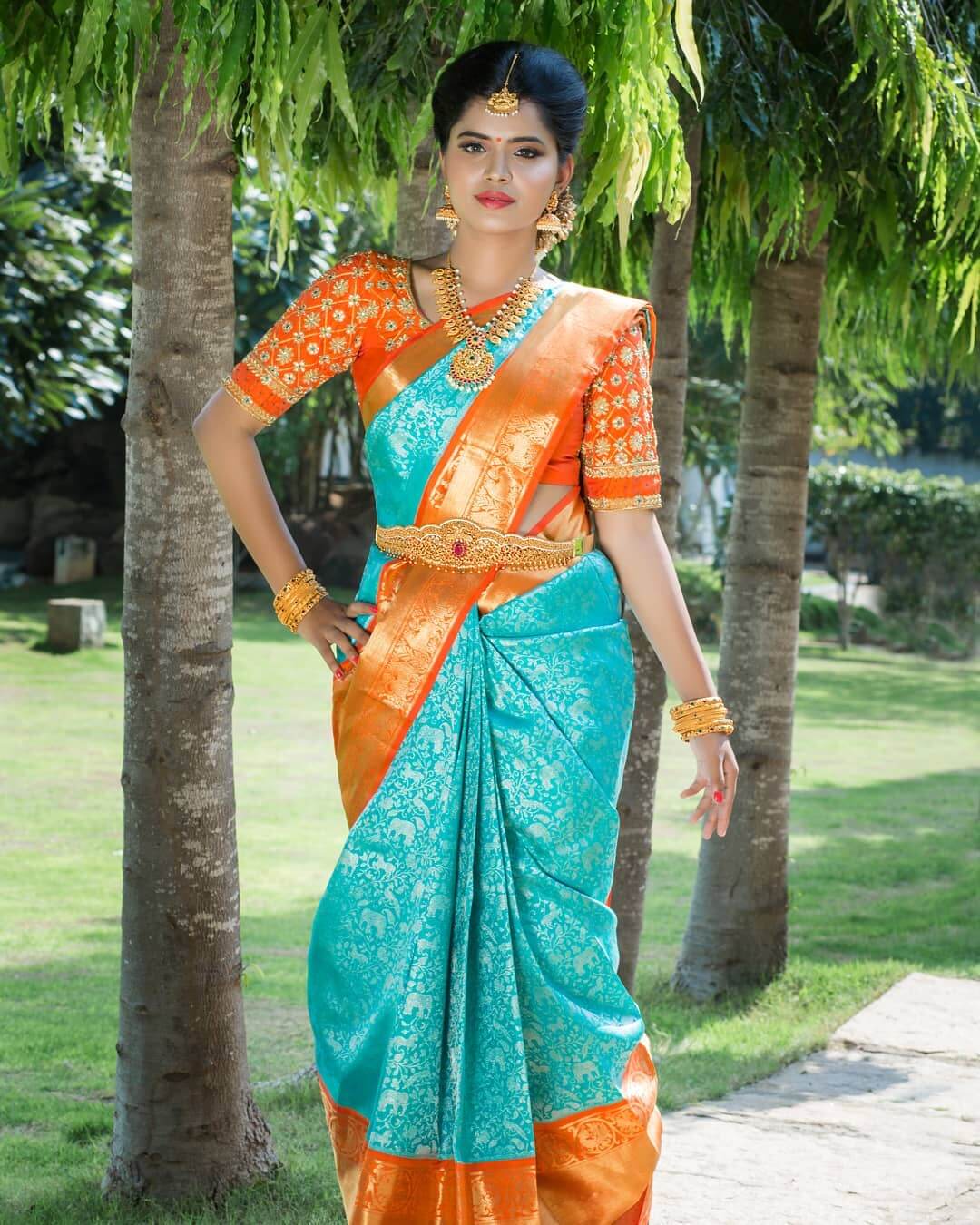 South Indian wedding saree in blue and orange