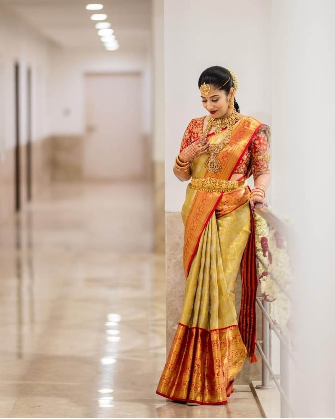 Kanjivaram silk wedding saree in yellow and red