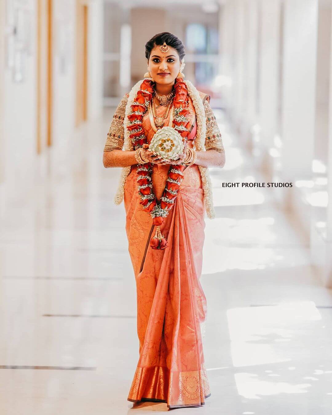 South Indian wedding saree in light orange