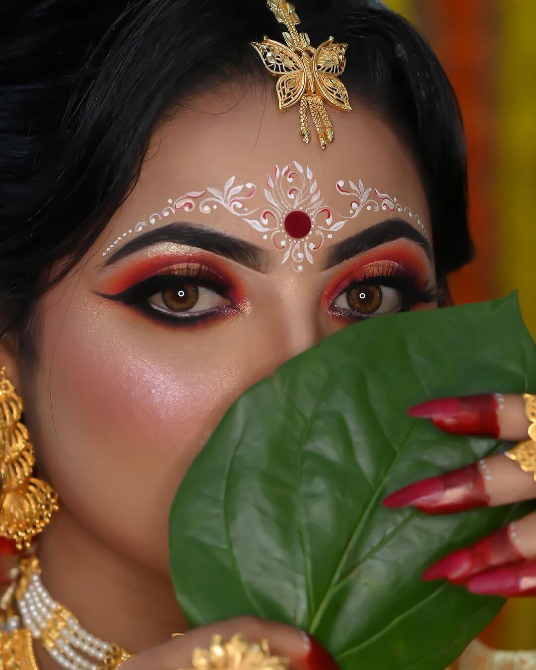 Red and gold bridal eye makeup