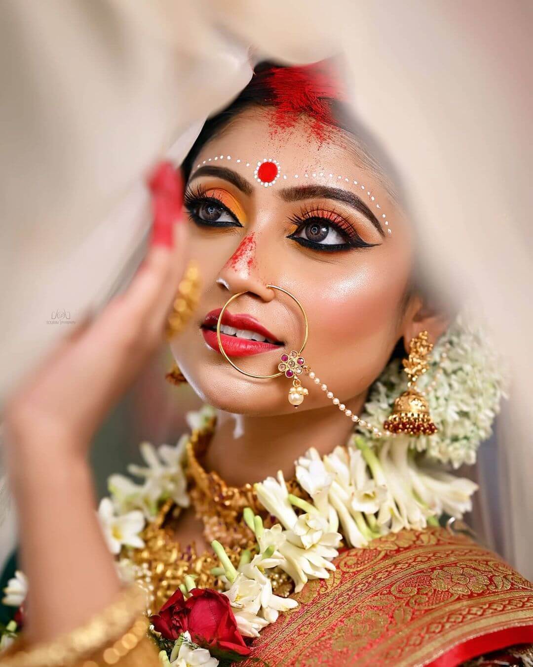 Bengali Bridal eye Makeup Sunset rays theme bridal eye makeup
