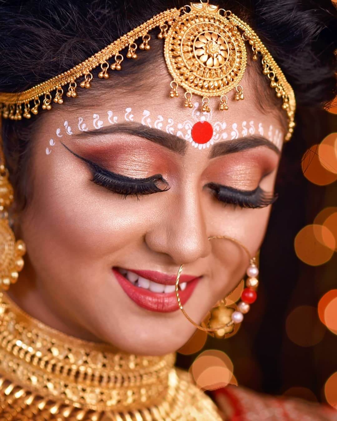 Bengali Bridal eye Makeup Shiny skin colour bridal eye makeup