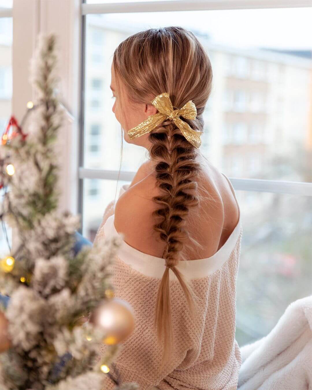 Christmas Hairstyles For Girls French braid with gold ribbon