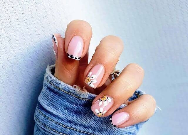 Pink Nail Art with Animal Prints and Daisy