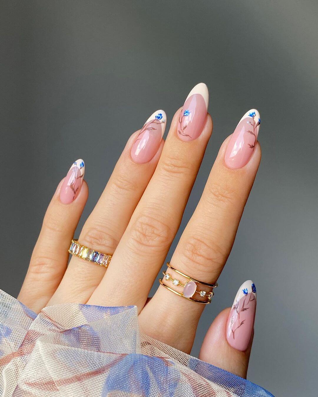 Pink Nail Art with Blue Flower