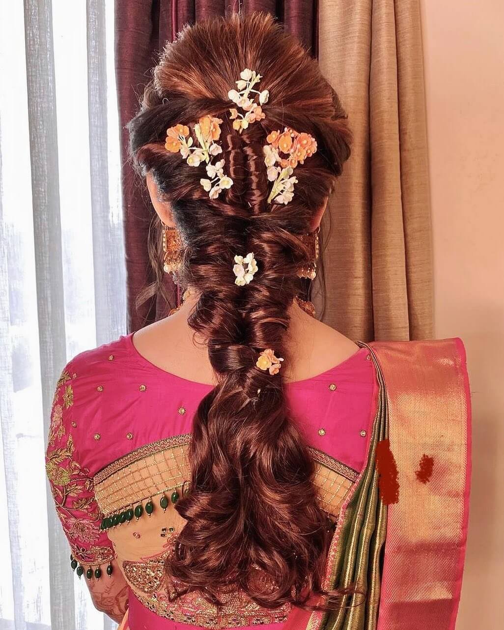 French braided hairstyle for Maharashtrian bride