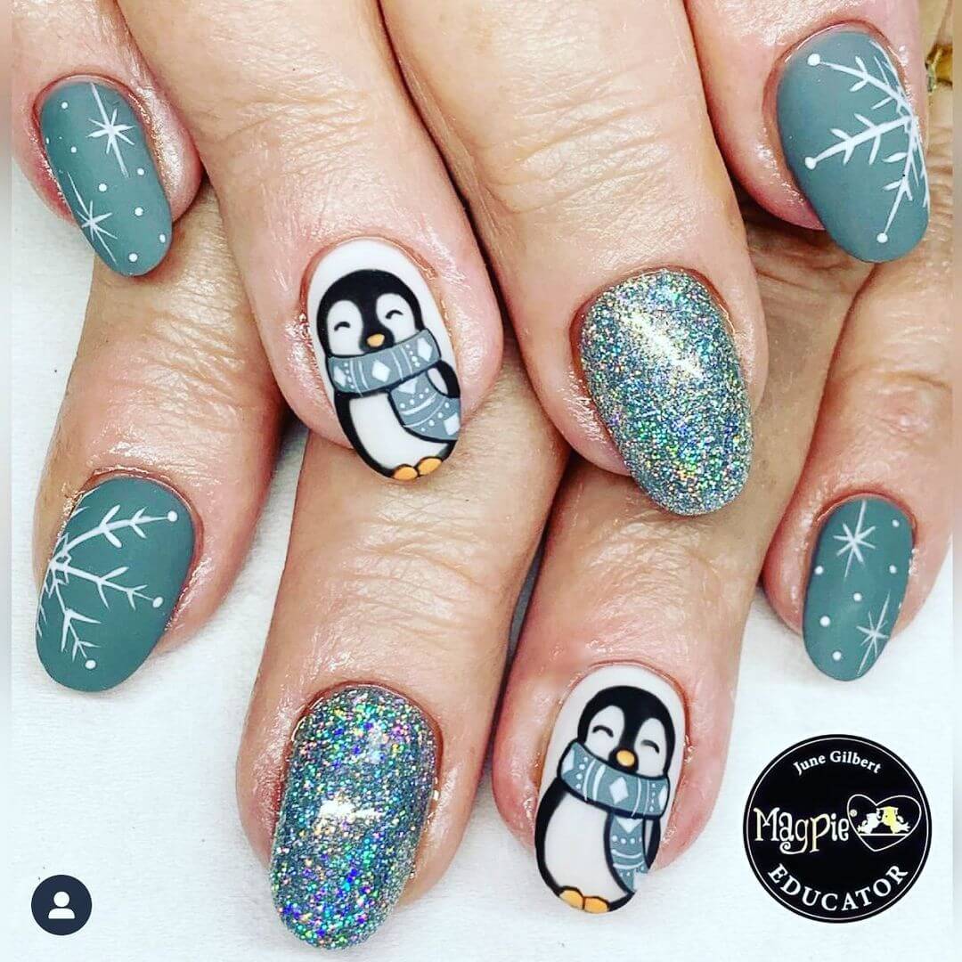 Penguin Nail Art Snowflakes with Penguin Over Green Nail Art Design