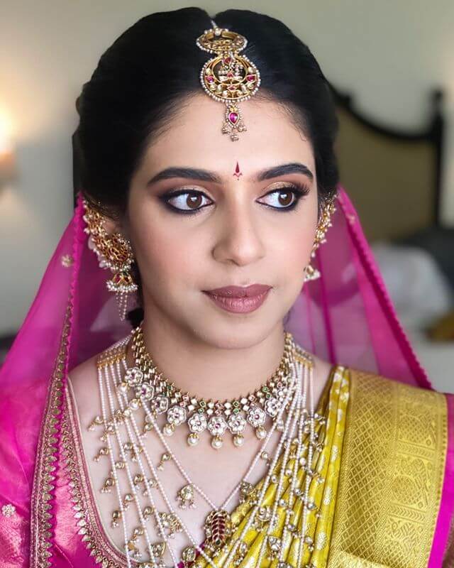 Brown toned makeup will enhance the bridal look