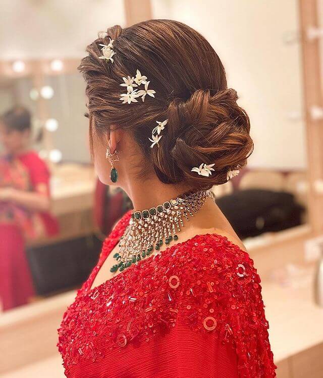 Twisted Bridal Bun with Loose Braids Best of Braided Bun Hairstyles for the Beautiful Bride