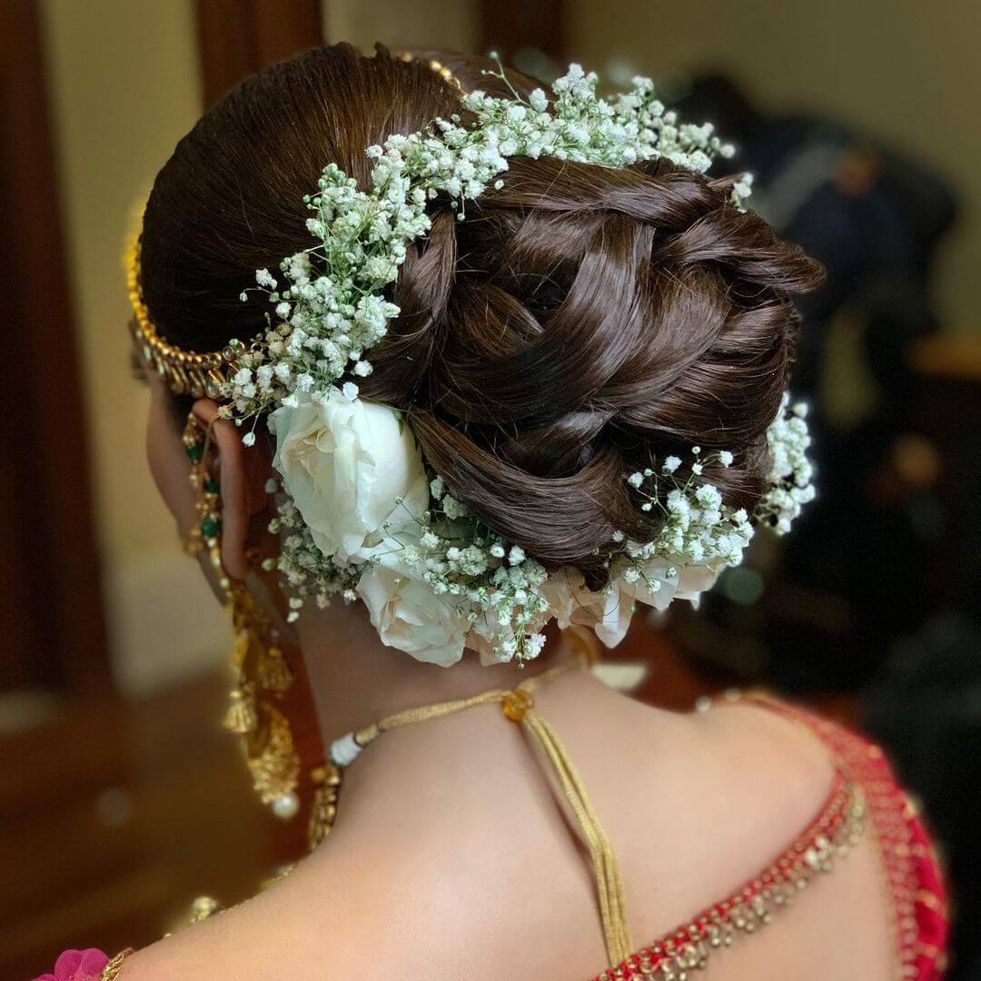 Braided Bridal Bun Surrounded with White Baby Breaths Best of Braided Bun Hairstyles for the Beautiful Bride