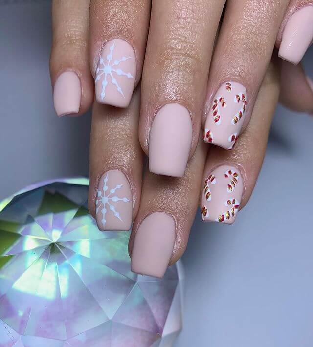 Pastel Pink Candy Cane Nail Art Candy Cane Nail Art Designs for the Christmas Season