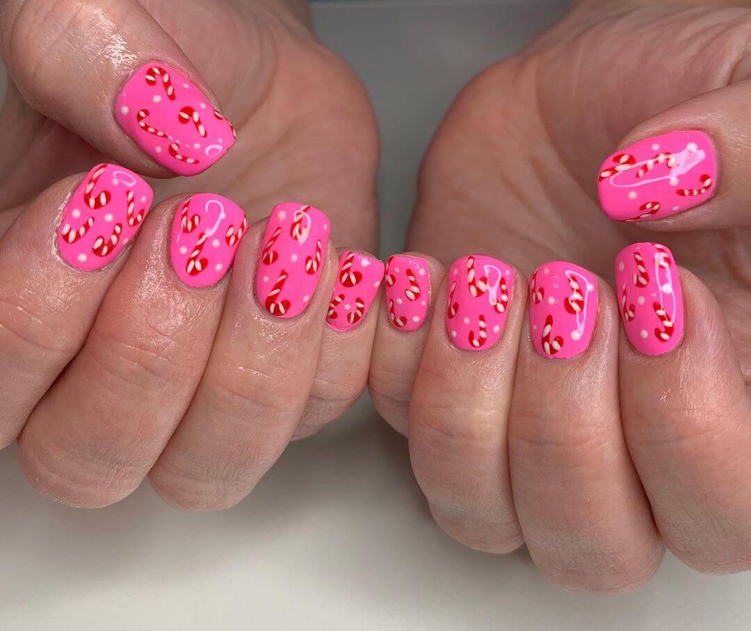 Bright Pink Nail Art with Candy Canes