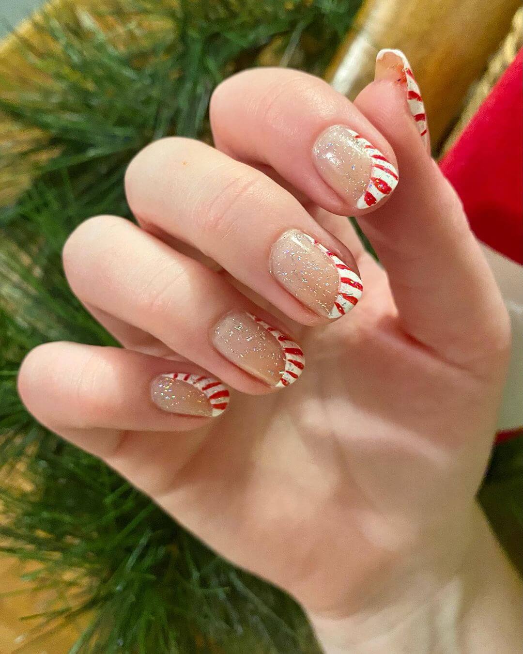 The Sparkly Candy Cane Nail Art Candy Cane Nail Art Designs for the Christmas Season
