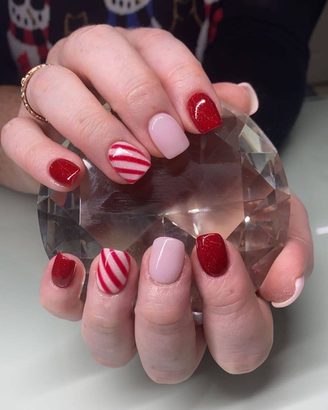 Red and White Striped Nail Art Candy Cane Nail Art Designs for the Christmas Season