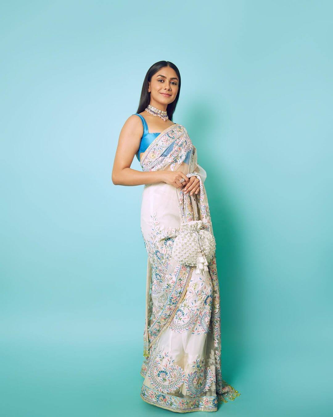 Mrunal Thakur's Traditional Outfit Ideas for Bridesmaids this Wedding Season Elegant White Saree with Blue Blouse