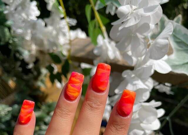 Orange, Pink, and Yellow Marble Nail Art