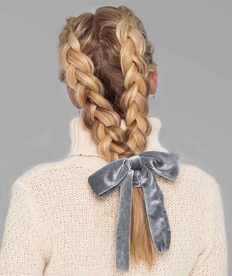 Two Dutch Braids With A Common Velvet Tie