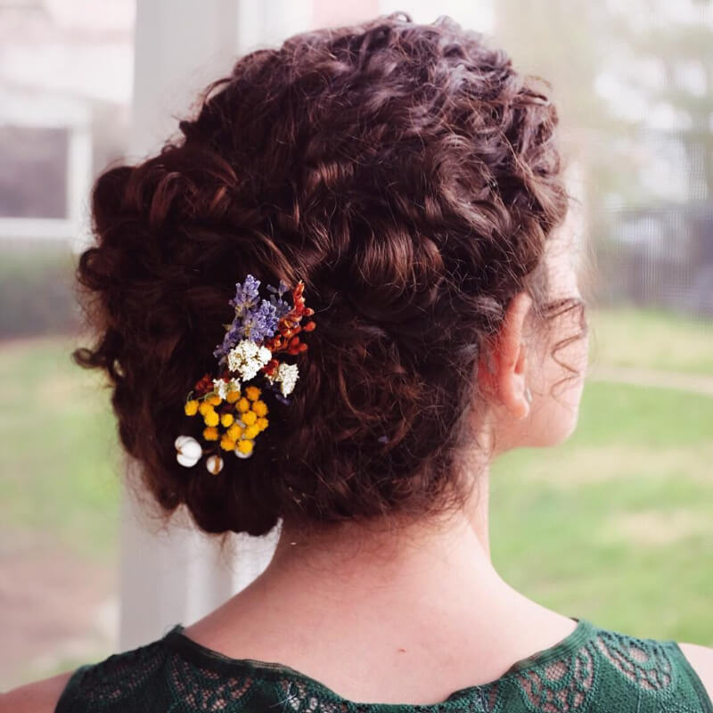 Simple Messy Bun with Floral Decorations