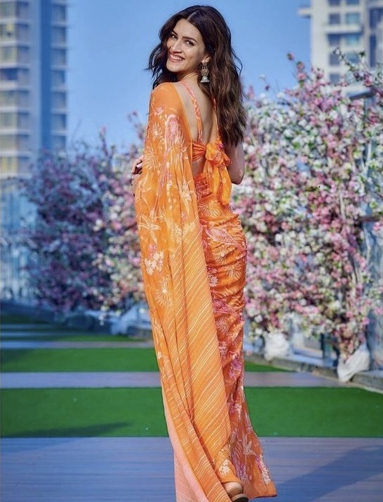 We Absolutely Love This Bright Orange Attire Donned By Kriti Sanon