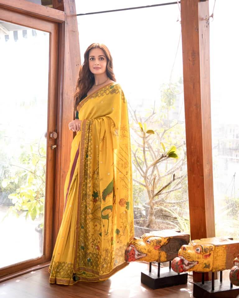 Actresses Dia Mirza in yellow saree with hand-painted details by  Archana Jaju