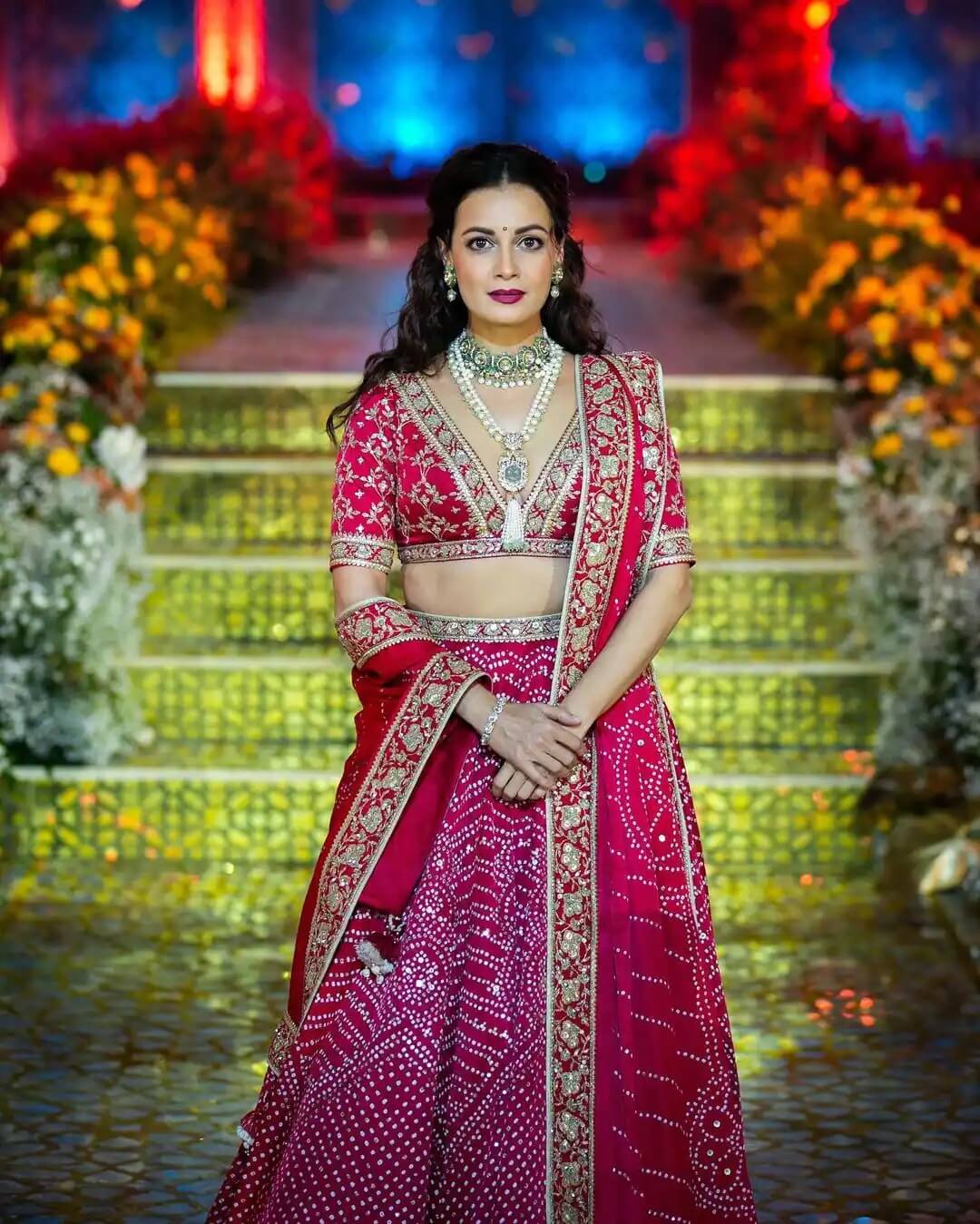 Dia Mirza looks bold, elegant, and graceful in the vibrant red color lehenga set