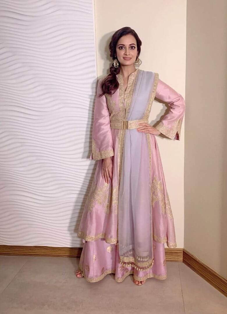 Thappad Movie Actress in a pink flared kurta with wide-legged pants and lilac tulle dupatta sharara set by Manish Malhotra