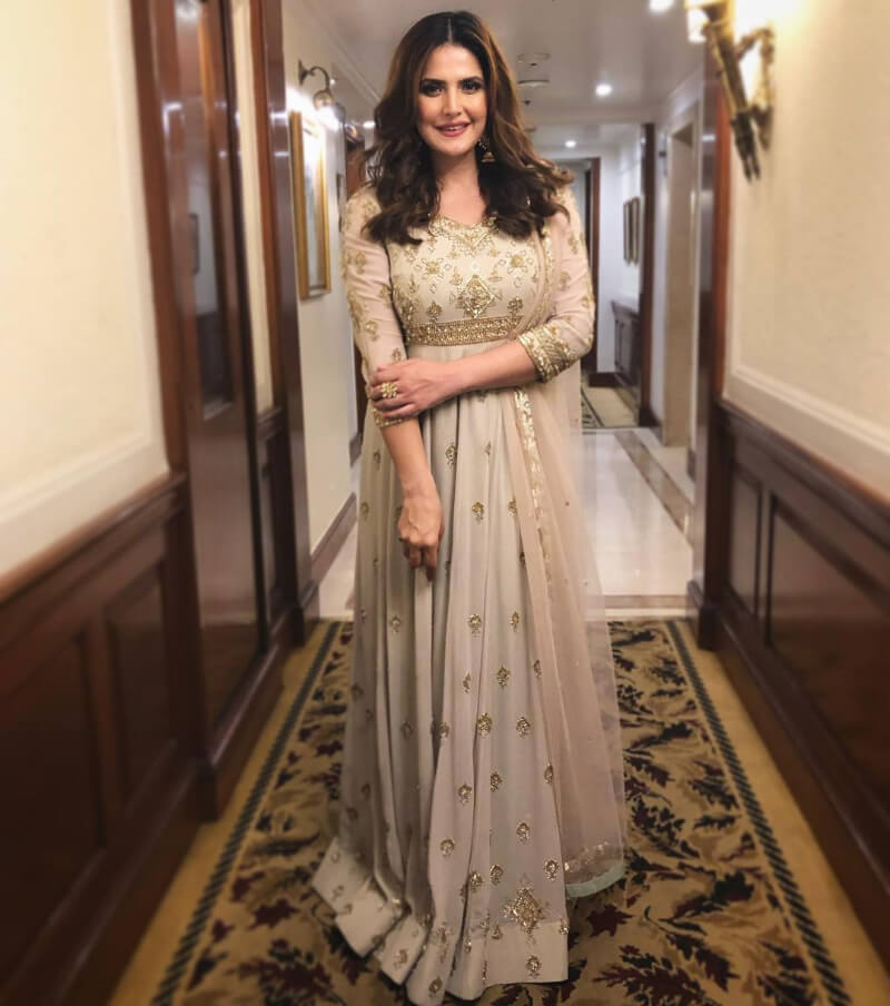 Housefull 2 Actress Zareen Khan in a long suit set with golden details 