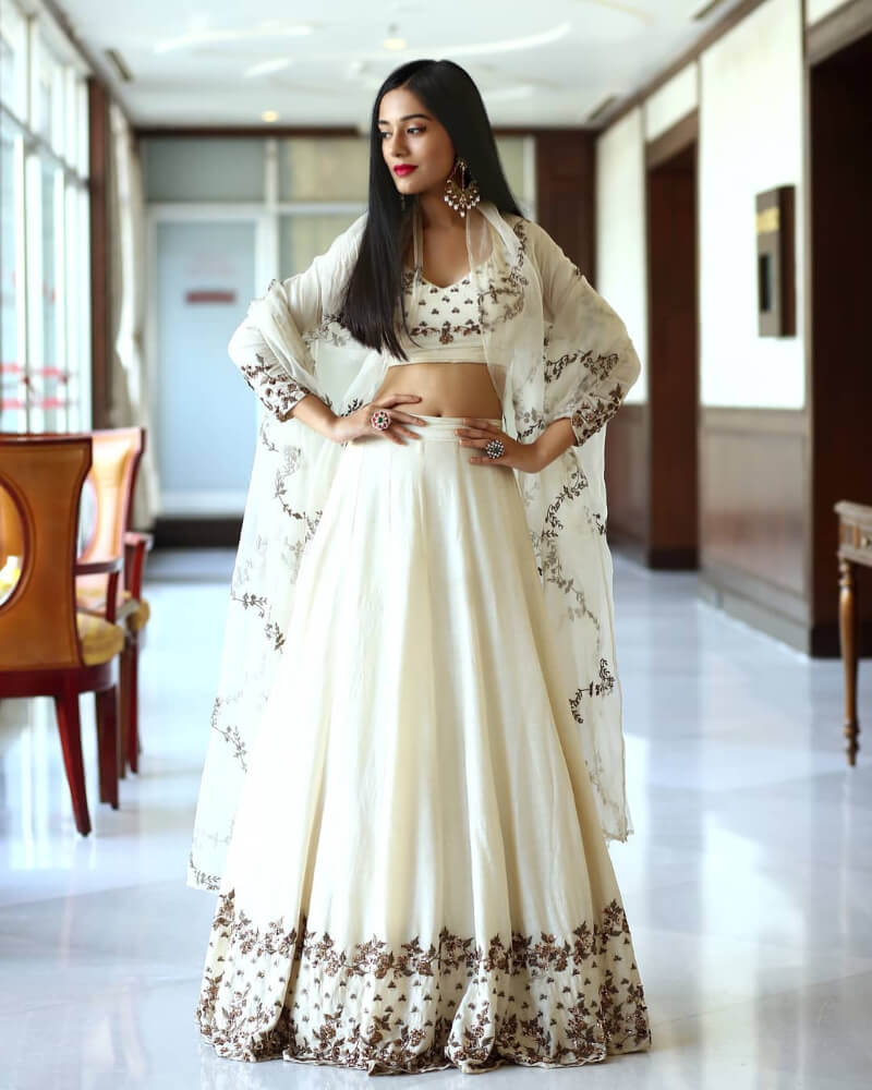 Amrita looks stunning  in minimal basic white printed lehenga with a matching dupatta