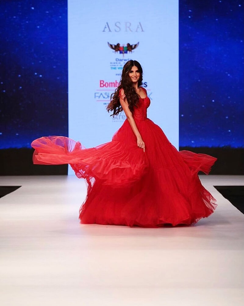 At runway at Bombay Times Fashion Week Tara Sutaria in red flowy gown