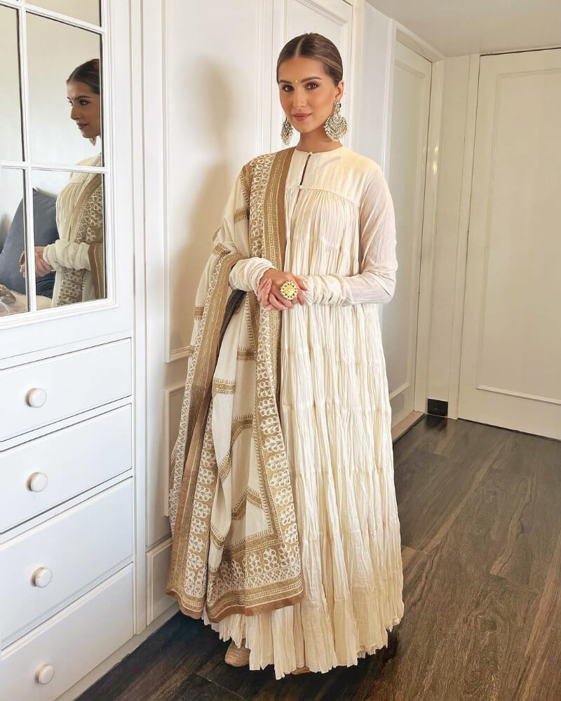 Bollywood Actress Tara Sutaria for Diwali celebration wore an ivory Anarkali by designer Punit Balana