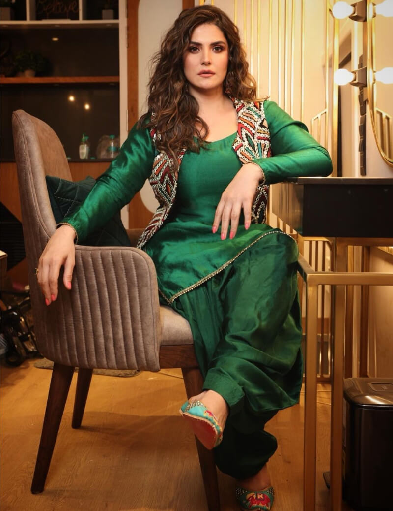Aksar 2 Actress Zareen Khan in bottle green suit with colorful outer