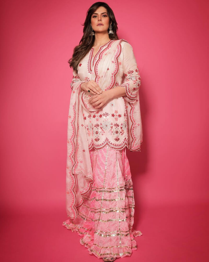 Zareen Khan wishes Eid Mubarak in a pink sharara set with golden gota work