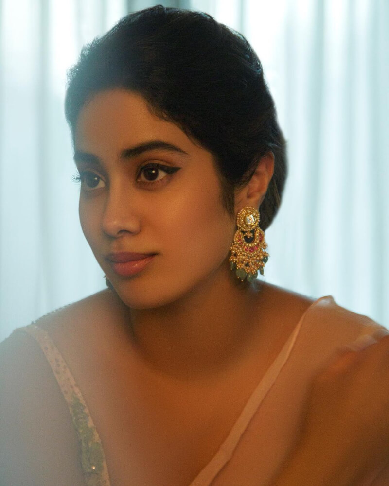 Janhvi Kapoor's Earrings Game is Always on point Janhvi kapoor in gold toned earring with stones perfect for wedding