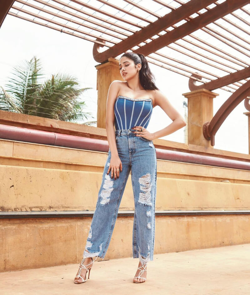 Janhvi Kapoor's Trendy Western Outfits Can Be Your Next Inspiration Janhvi Kapoor promotes Good Luck Jerry in a strapless bodysuit top with ripped jeans