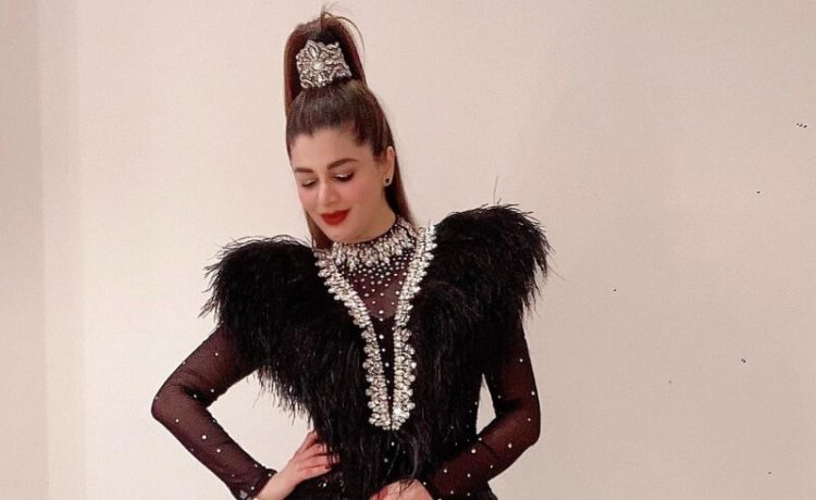 Kainaat Arora in Sexy Long Sleeve Black Sequin Jumpsuit with feather details