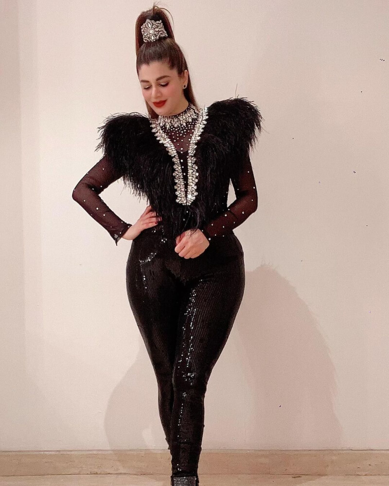 Kainaat Arora in Sexy Long Sleeve Black Sequin Jumpsuit with feather details