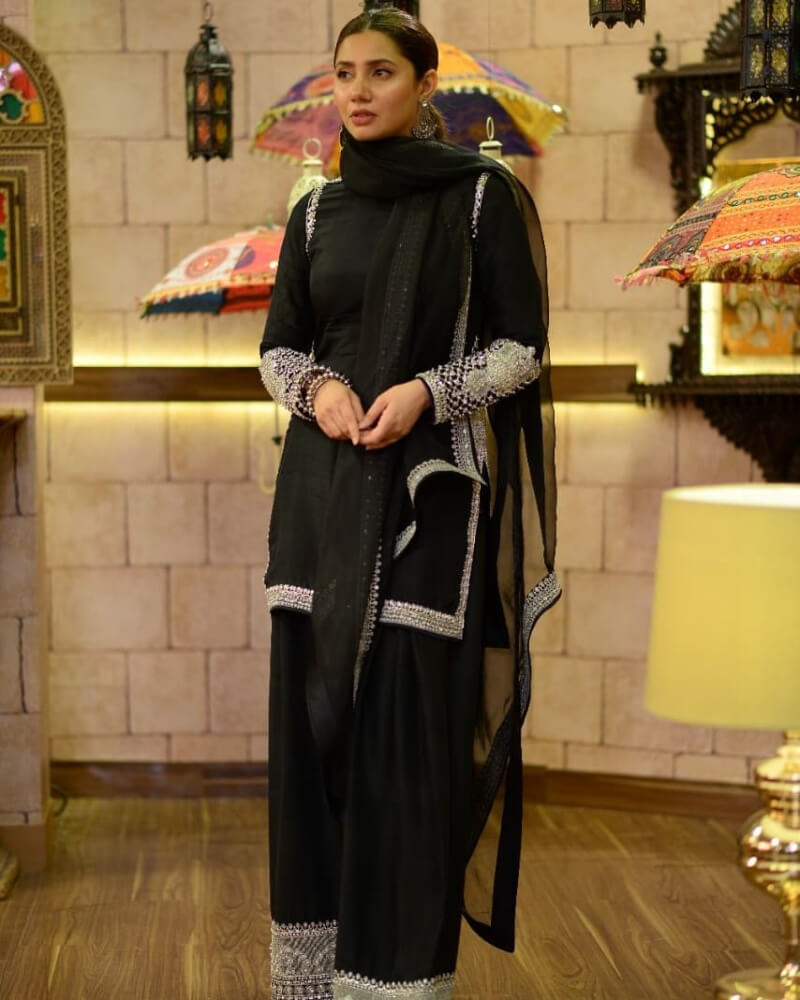 Mahira Khan In black dress with heavy silver embroidery and cutouts